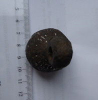 находка древнерусского кистеня ташуированного серебром