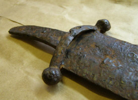 Сабельное перекрестье на мече