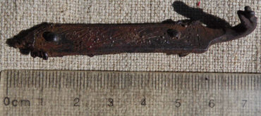 Элемент тула или налучья, так называемый:« колчанный крюк»