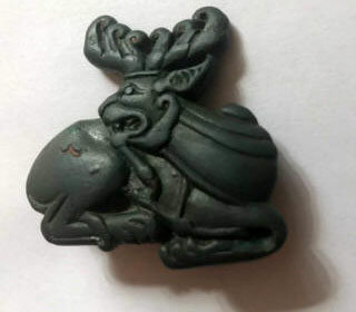 Скифская бляха изображающая фантастическое животное