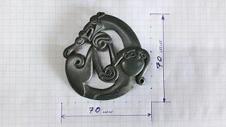 Скифская бляшка: Свернувшаяся калачиком пантера